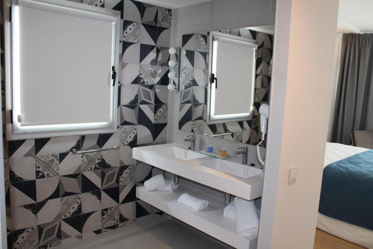 Cama o camas de una habitación en AQUA Hotel Onabrava & Spa 4*Sup