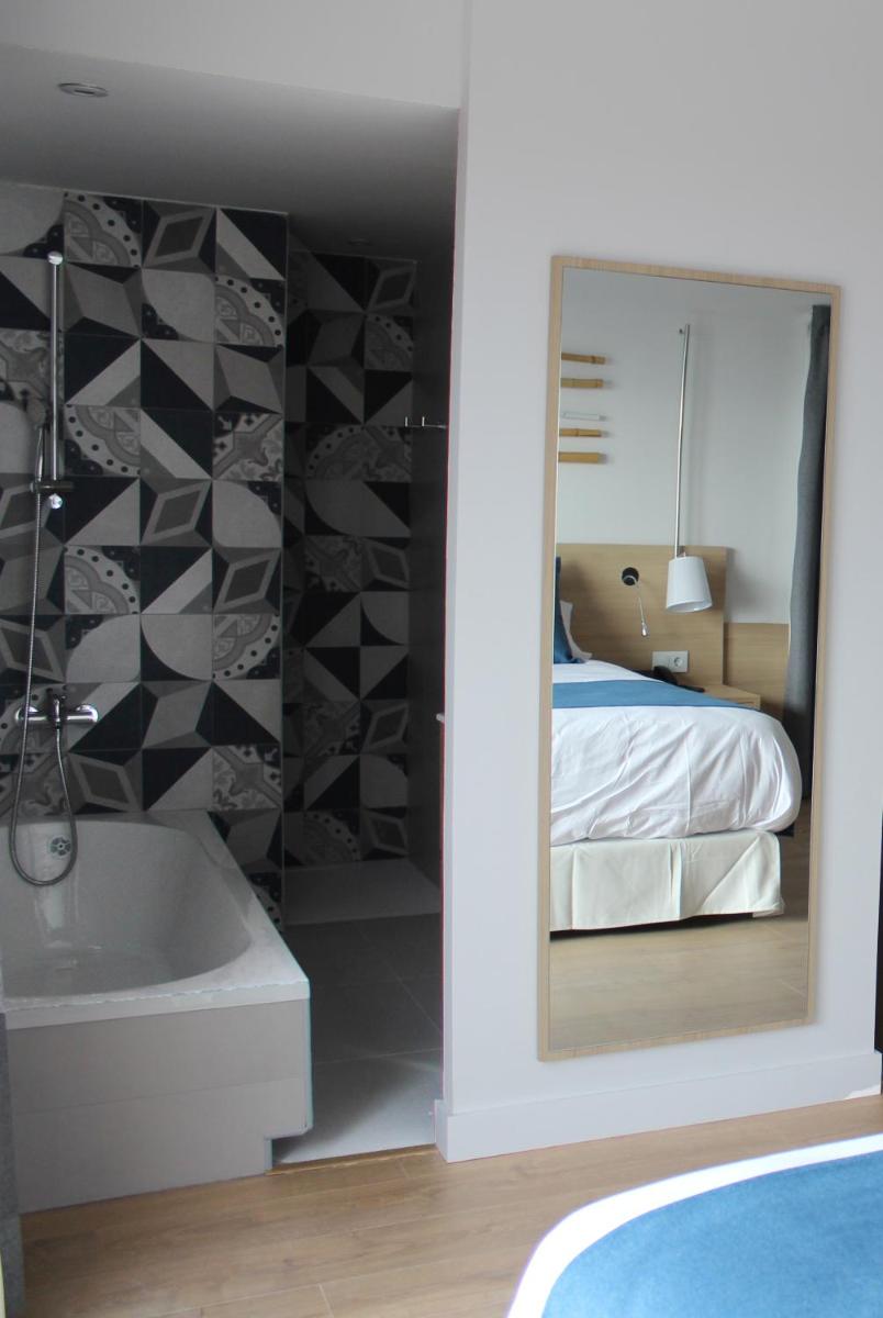 Cama o camas de una habitación en AQUA Hotel Onabrava & Spa 4*Sup