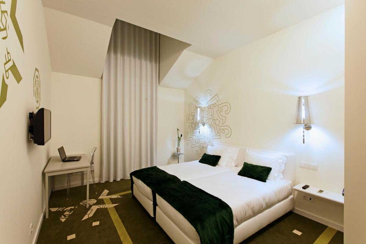 Uma cama ou camas num quarto em HD