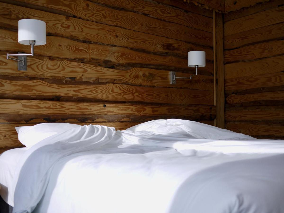 Un ou plusieurs lits dans un hébergement de l'établissement Alberta Hotel & Spa