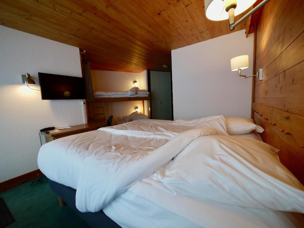 Un ou plusieurs lits dans un hébergement de l'établissement Alberta Hotel & Spa