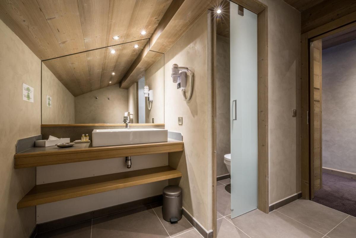 Salle de bains dans l'établissement Hotel Le Samoyede