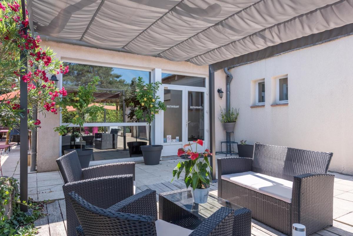 Coin salon dans l'établissement Le Clos des Bruyères