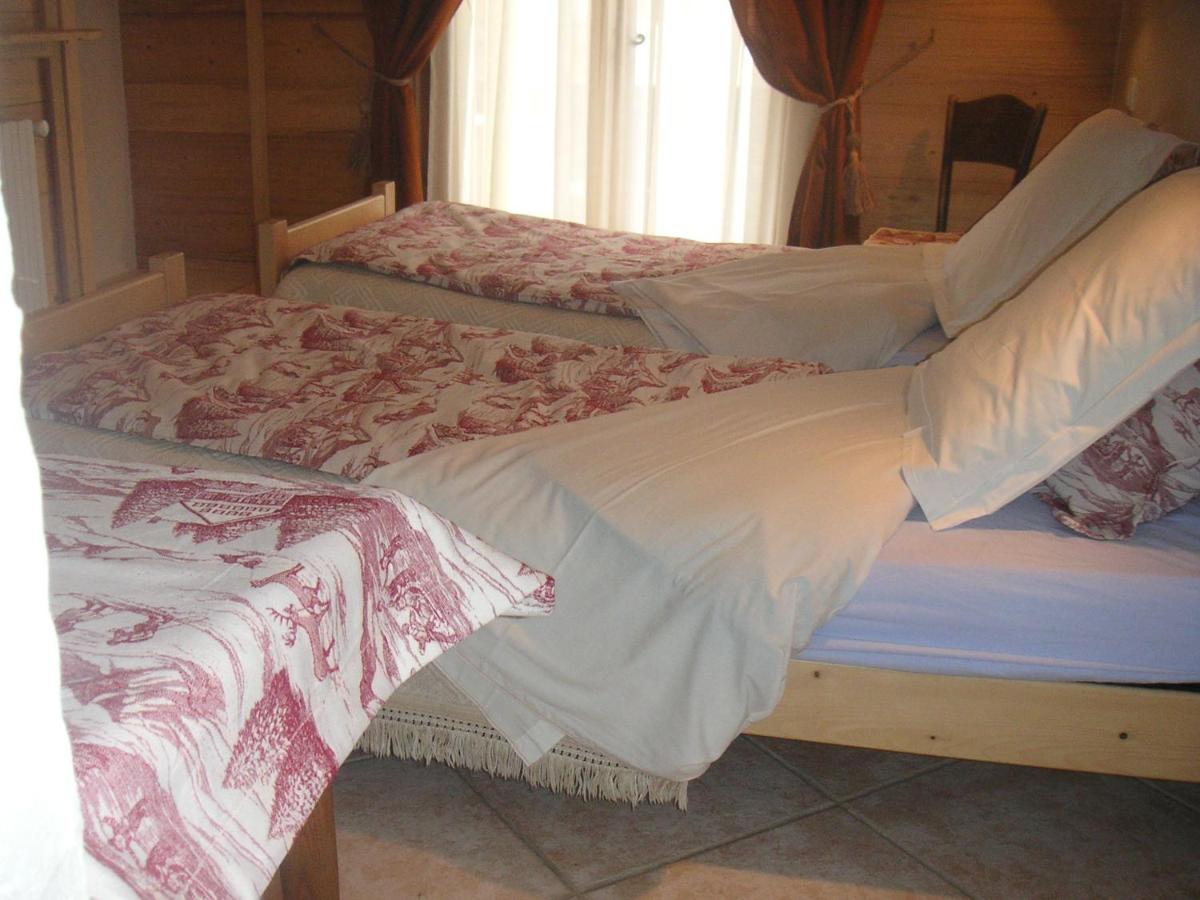 Un ou plusieurs lits dans un hébergement de l'établissement Apart'hotel & Spa "La Destière"