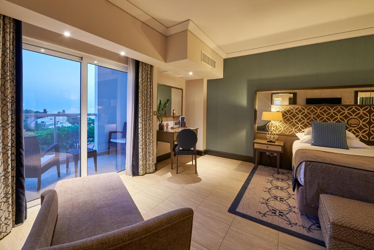 Uma cama ou camas num quarto em Dona Filipa Hotel