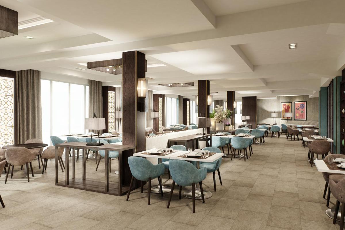 Um restaurante ou outro lugar para comer em Dona Filipa Hotel