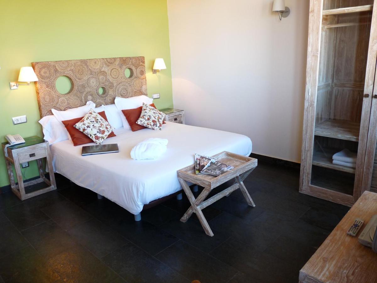 Cama o camas de una habitación en Eco Hotel Boutique & Spa Capitulo Trece - Adults Only