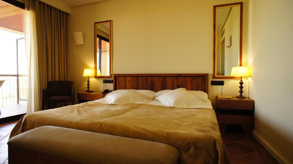 Cama o camas de una habitación en Hotel Cigarral el Bosque