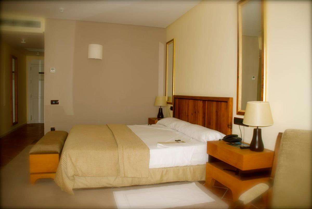 Cama o camas de una habitación en Hotel Cigarral el Bosque