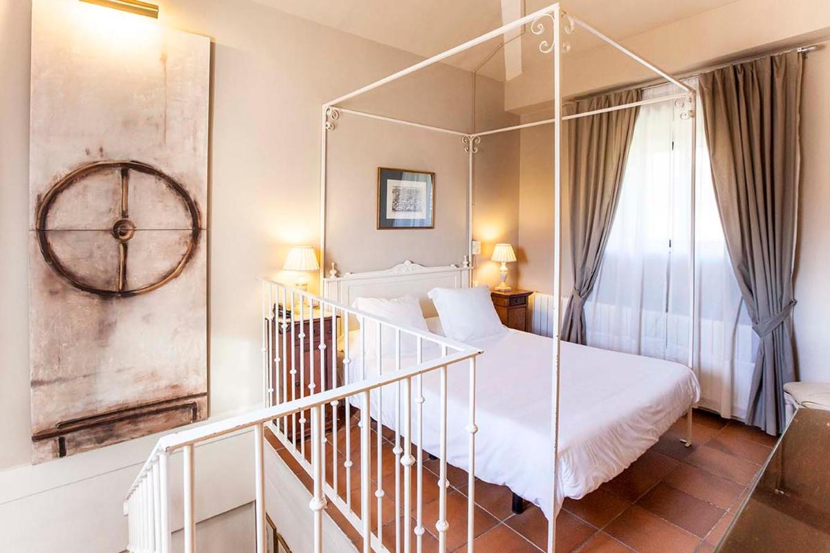 Cama o camas de una habitación en Hotel Spa Salinas de Imón