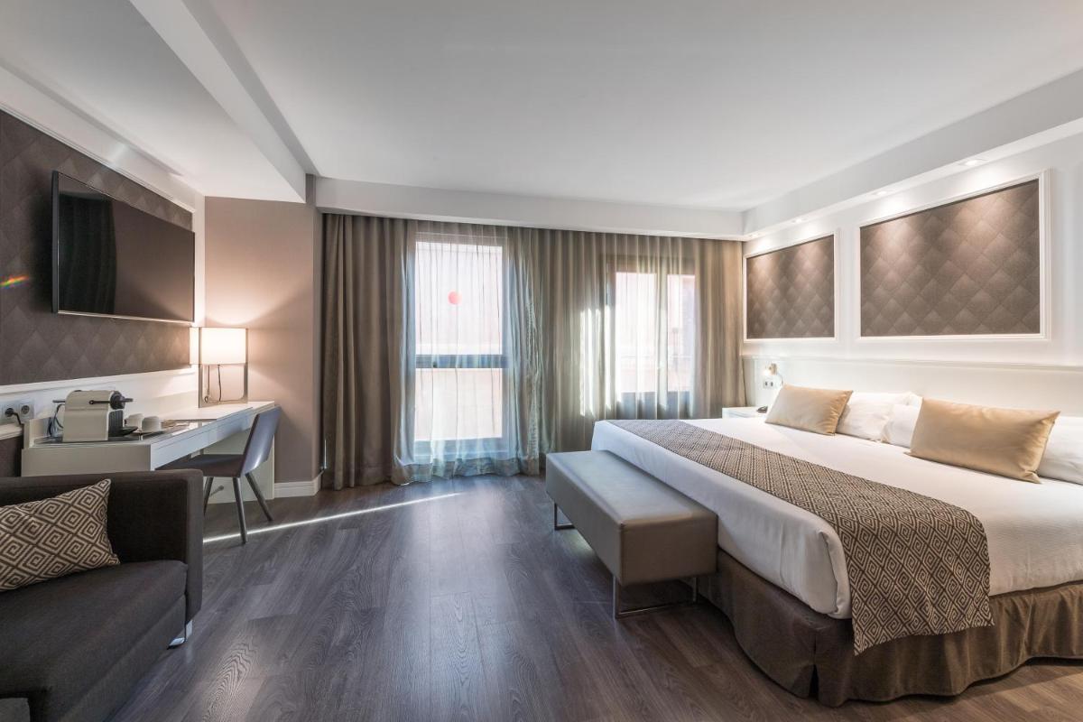 Cama o camas de una habitación en Catalonia Magdalenes