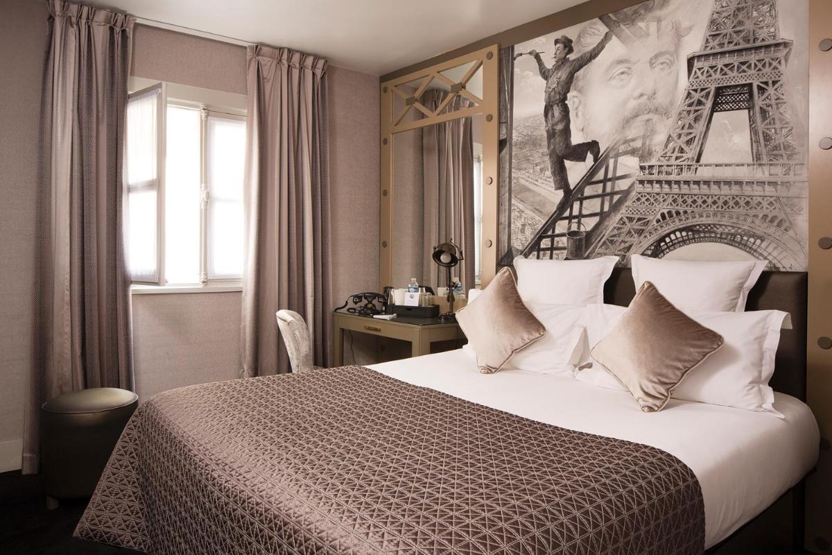 Un ou plusieurs lits dans un hébergement de l'établissement Hotel & Spa de Latour Maubourg