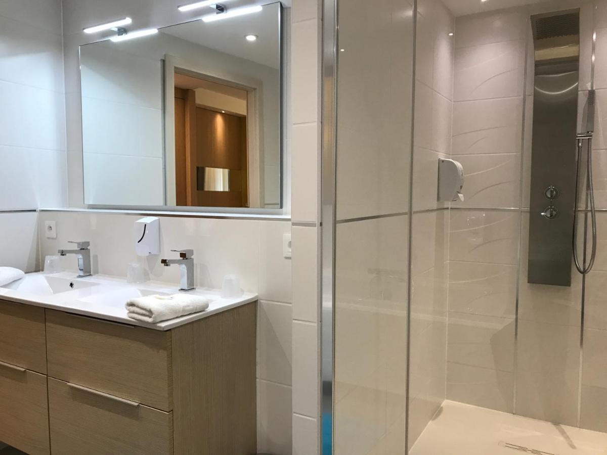 Salle de bains dans l'établissement Au Soleil, Hôtel Restaurant & Spa