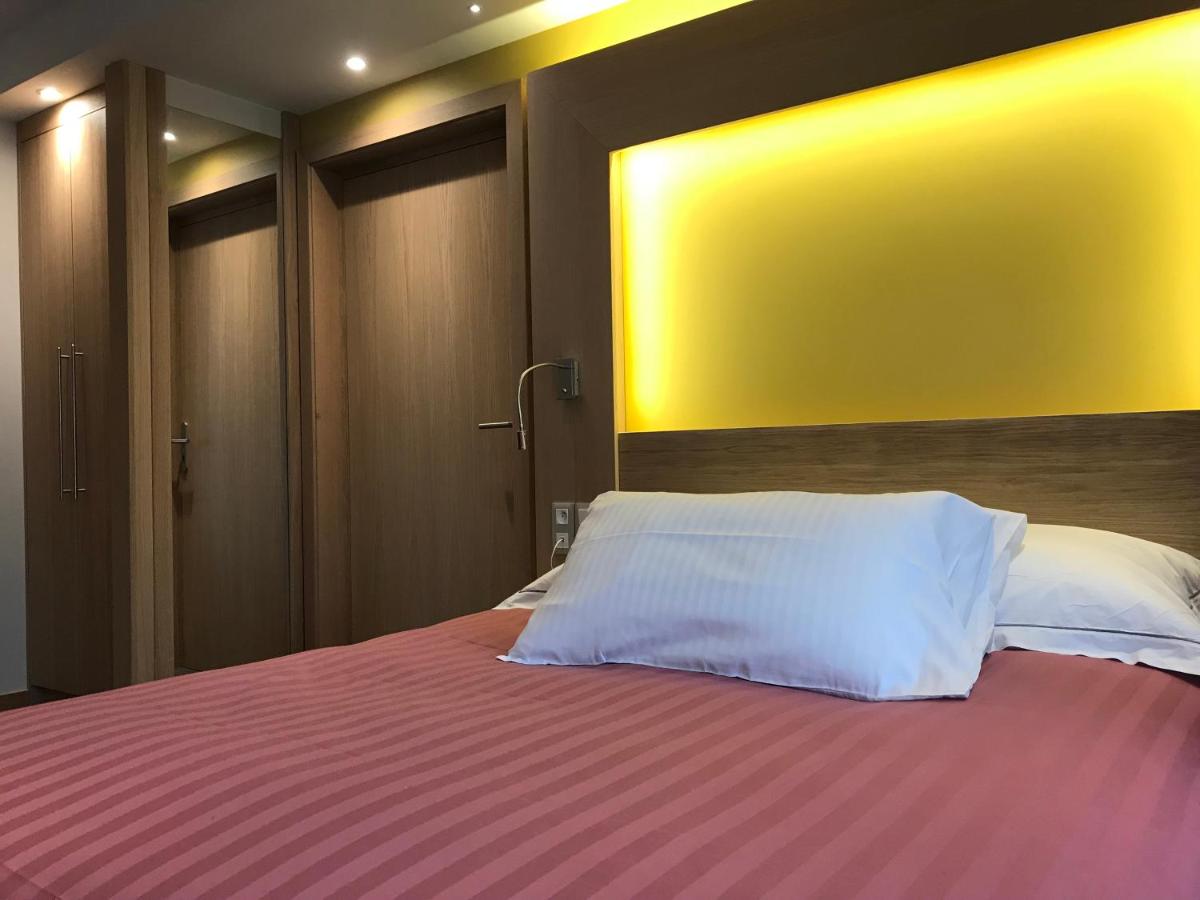Un ou plusieurs lits dans un hébergement de l'établissement Au Soleil, Hôtel Restaurant & Spa