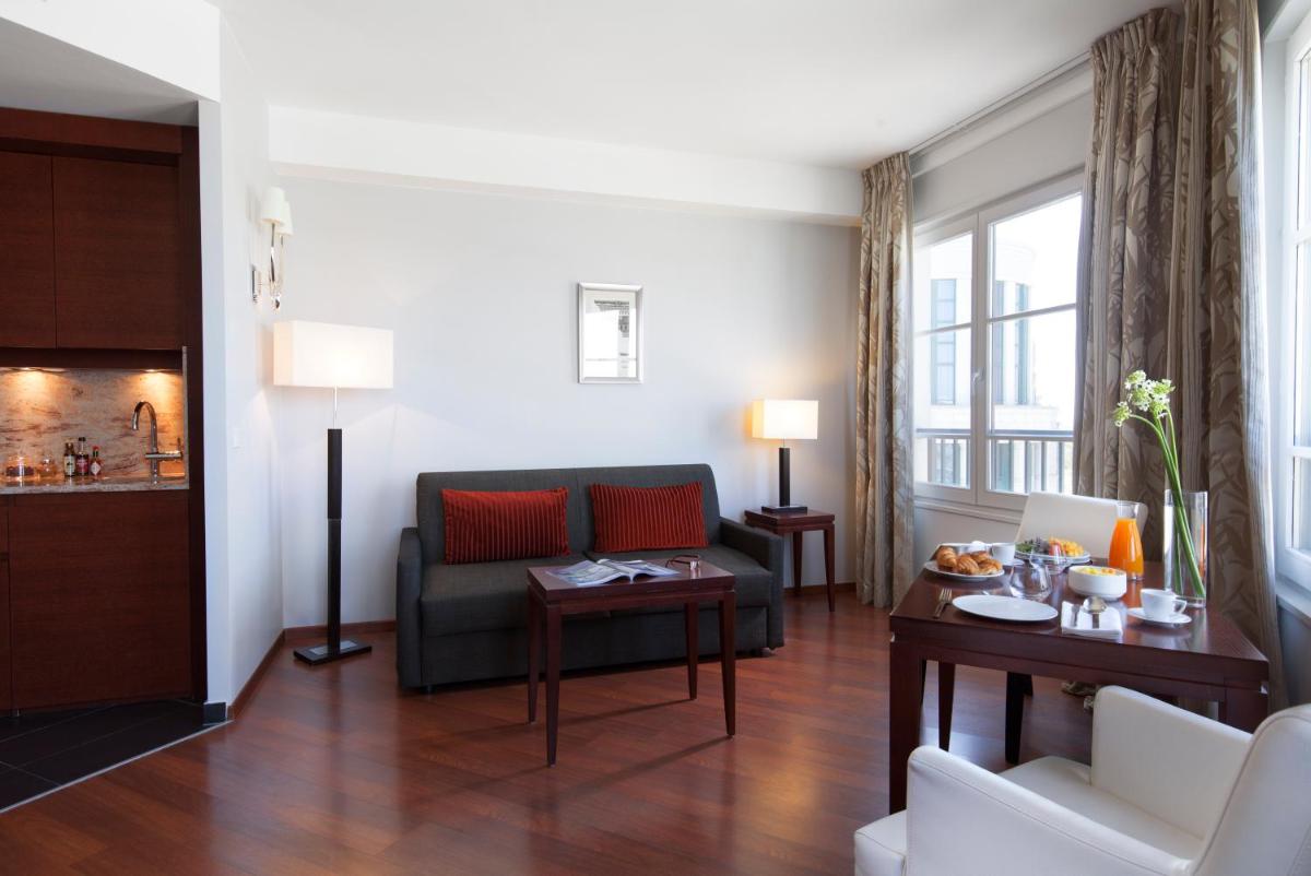Coin salon dans l'établissement Relais Spa Val d'Europe