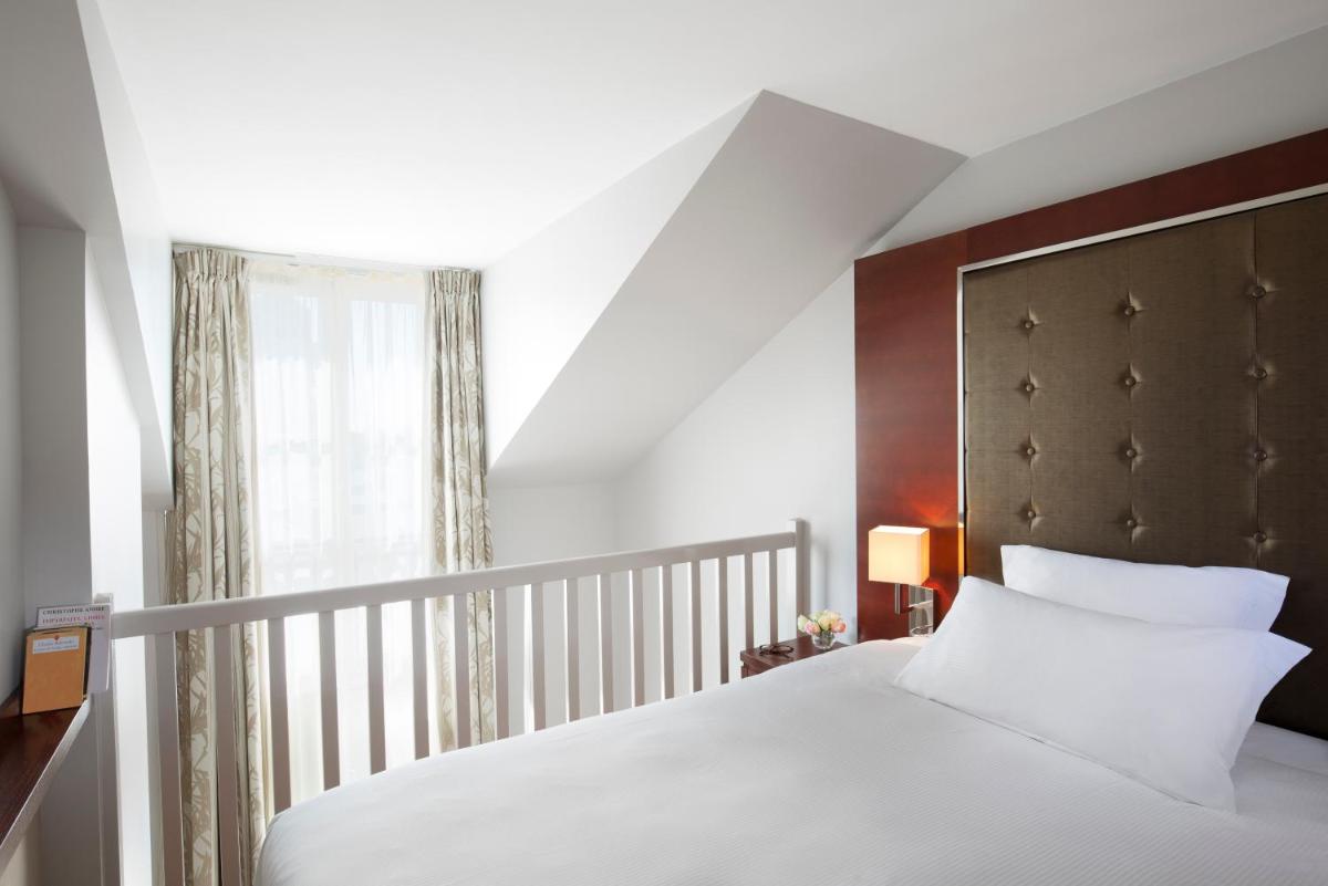 Un ou plusieurs lits dans un hébergement de l'établissement Relais Spa Val d'Europe