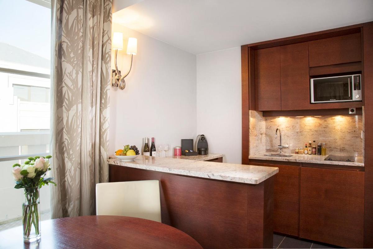 Cuisine ou kitchenette dans l'établissement Relais Spa Val d'Europe