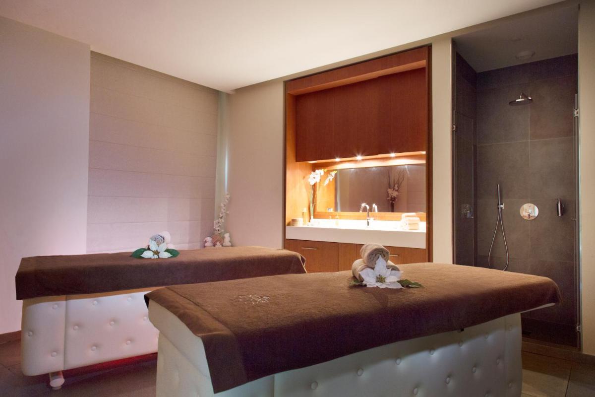 Un ou plusieurs lits dans un hébergement de l'établissement Relais Spa Val d'Europe