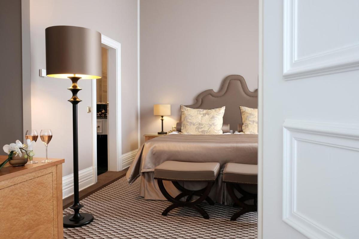 Ein Bett oder Betten in einem Zimmer der Unterkunft Althoff Grandhotel Schloss Bensberg