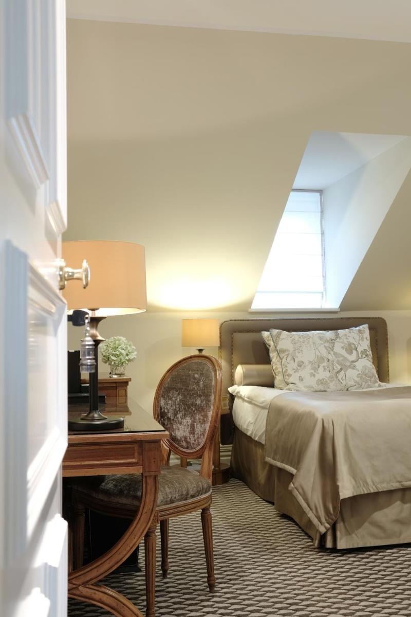 Ein Bett oder Betten in einem Zimmer der Unterkunft Althoff Grandhotel Schloss Bensberg