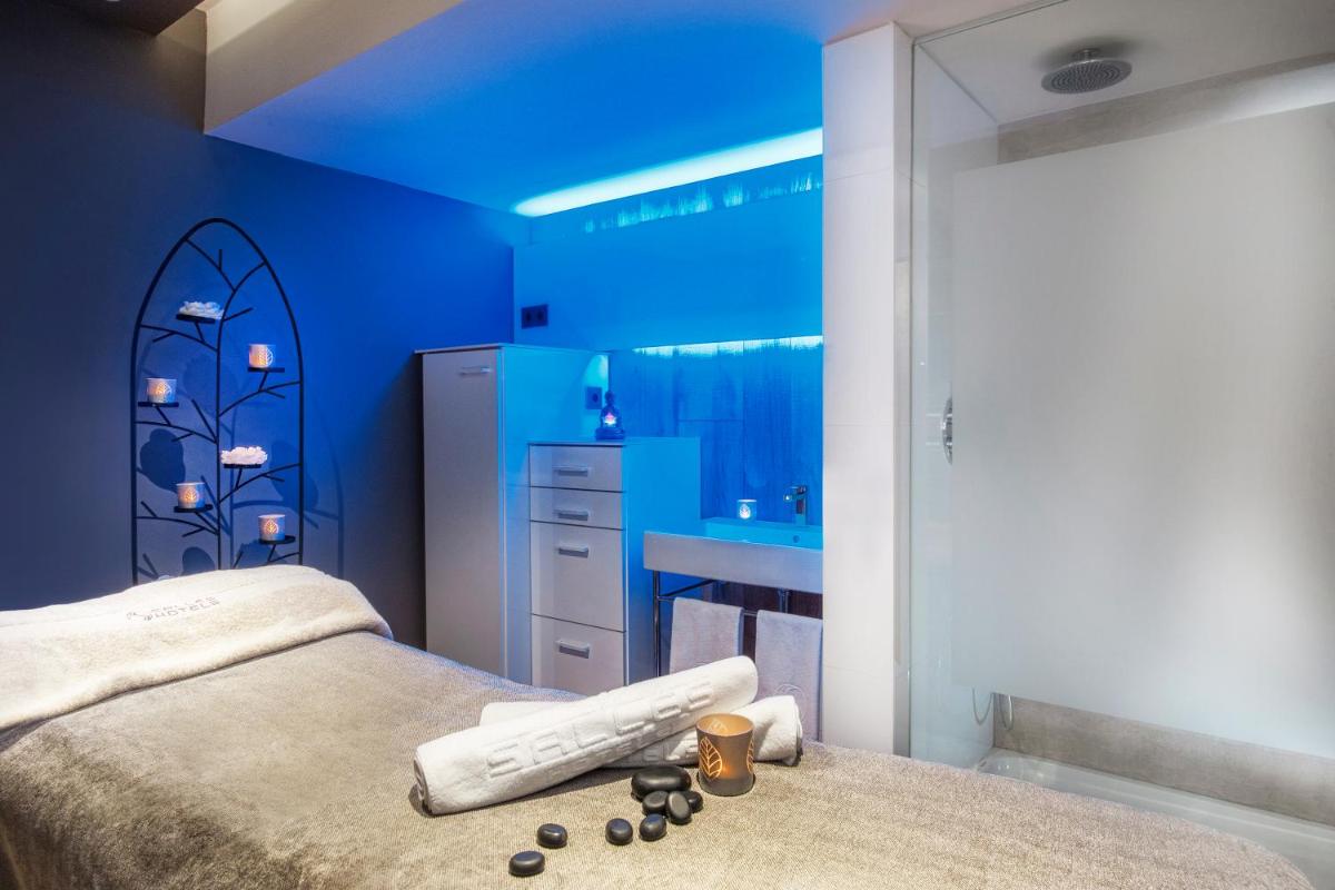 Cama o camas de una habitación en Sallés Hotel Pere IV