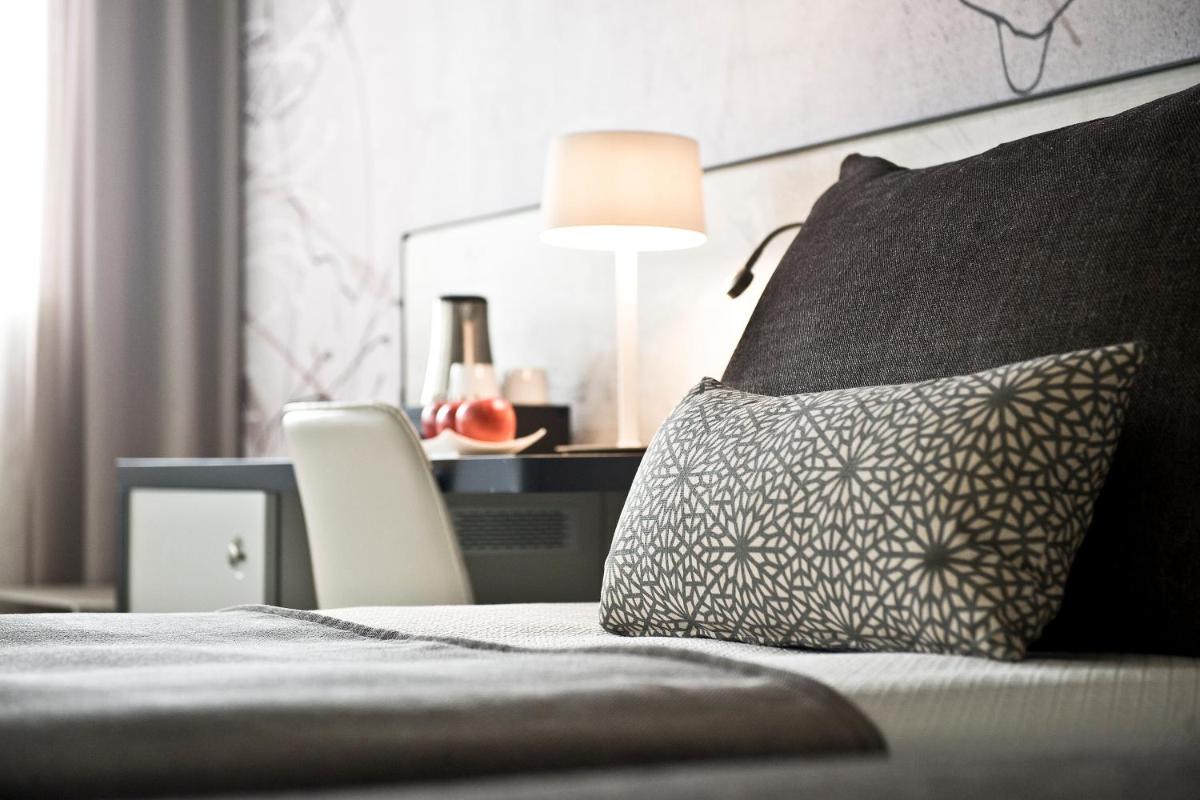 Cama o camas de una habitación en Sallés Hotel Pere IV