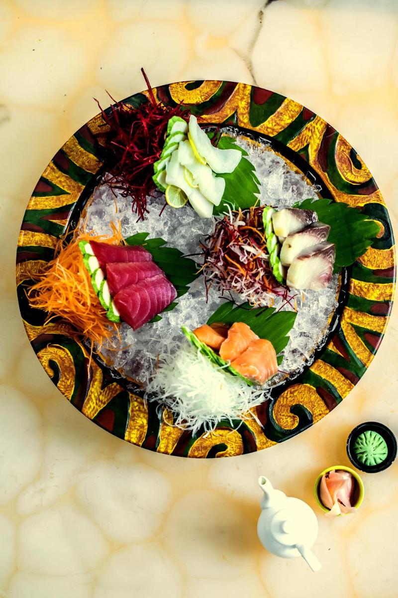 a plate of food on top of a table at The Lalit Chandigarh in Chandīgarh