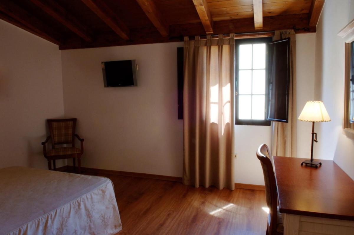 Cama o camas de una habitación en Balneario Cervantes