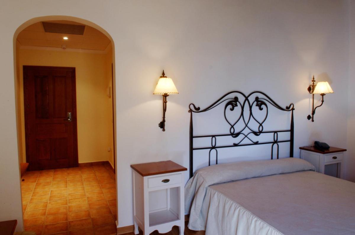 Cama o camas de una habitación en Balneario Cervantes