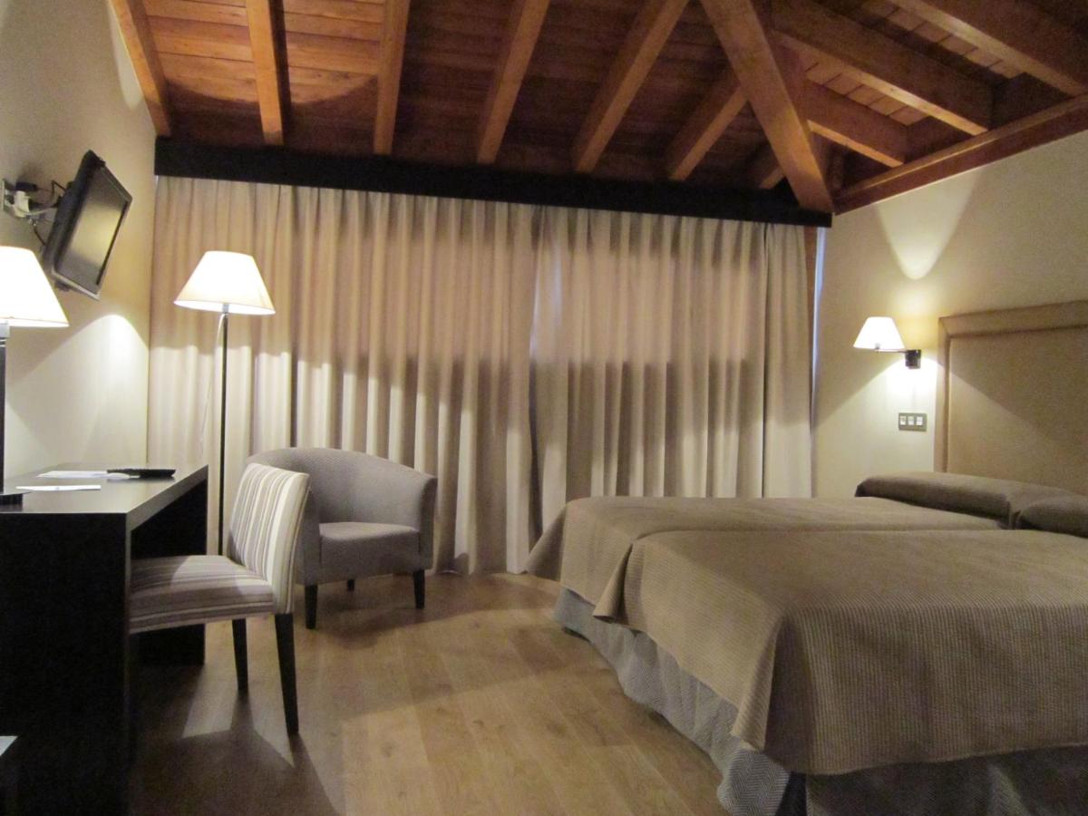 Cama o camas de una habitación en Balneario Cervantes