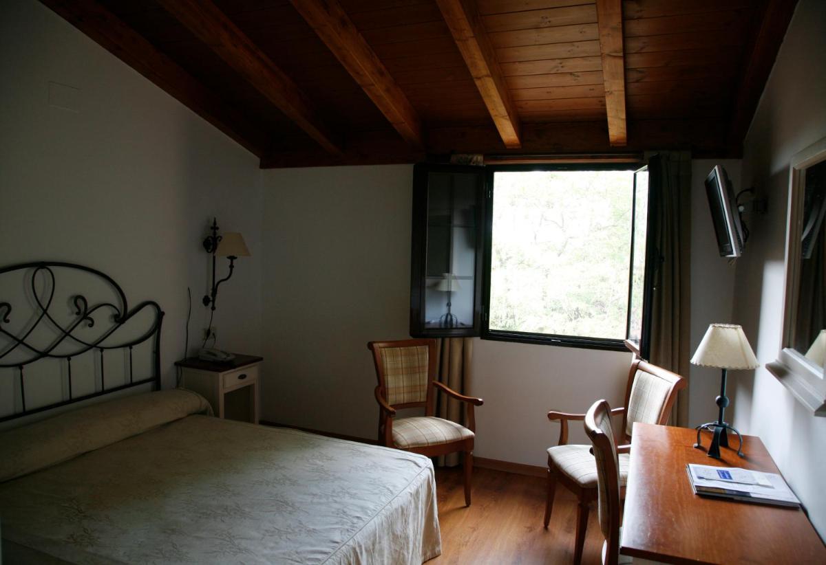 Cama o camas de una habitación en Balneario Cervantes
