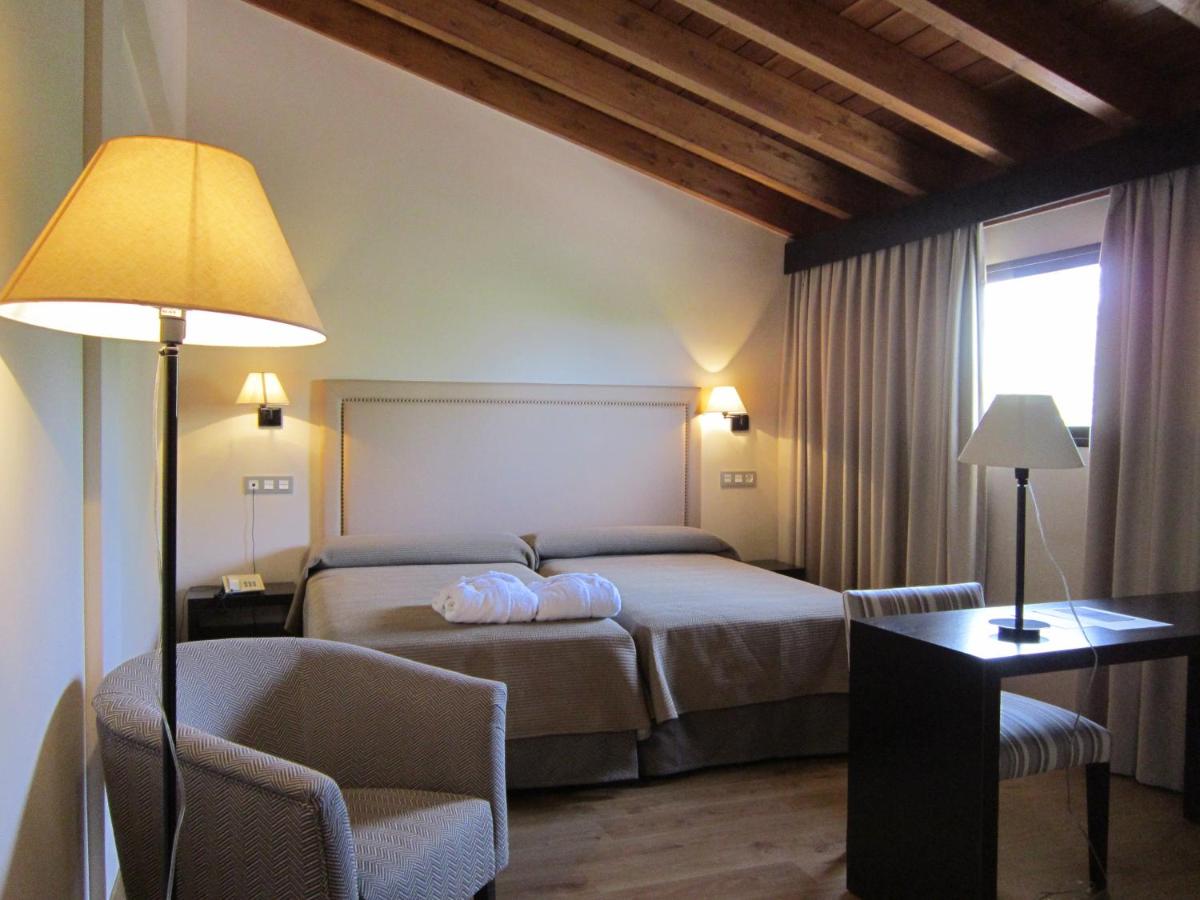 Cama o camas de una habitación en Balneario Cervantes