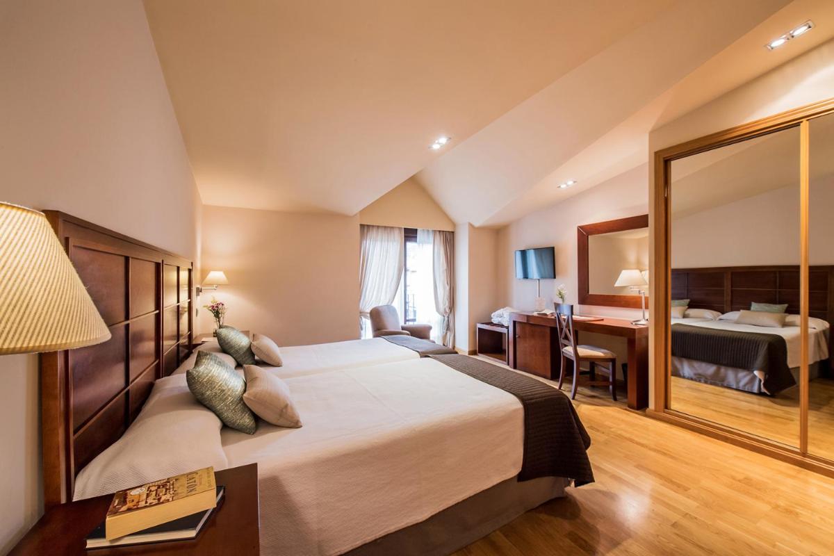 Cama o camas de una habitación en Hotel Villa Virginia