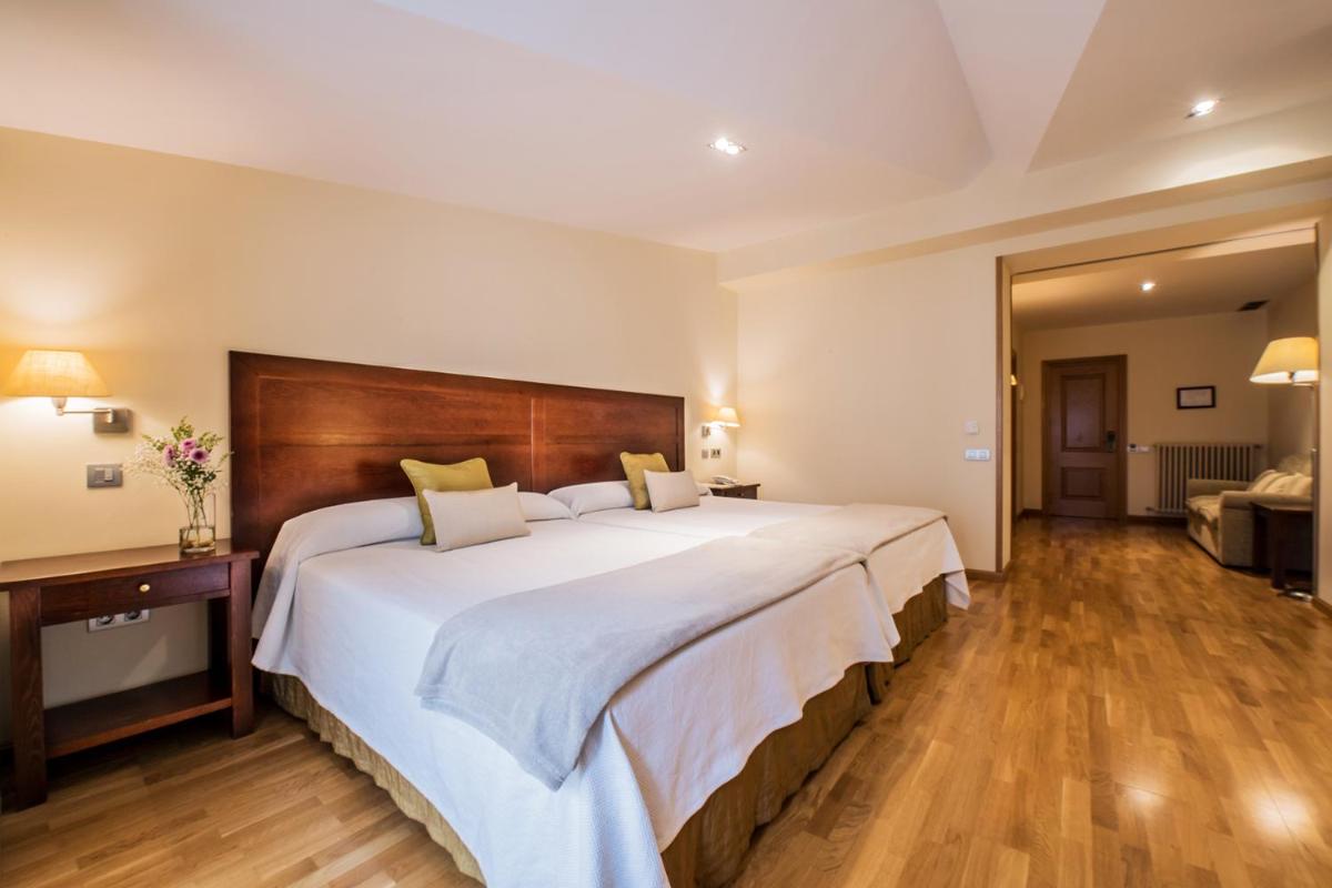 Cama o camas de una habitación en Hotel Villa Virginia