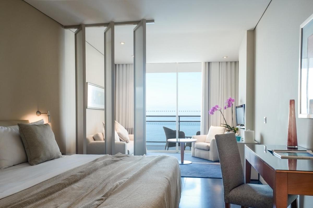 Uma cama ou camas num quarto em VidaMar Resort Hotel Madeira