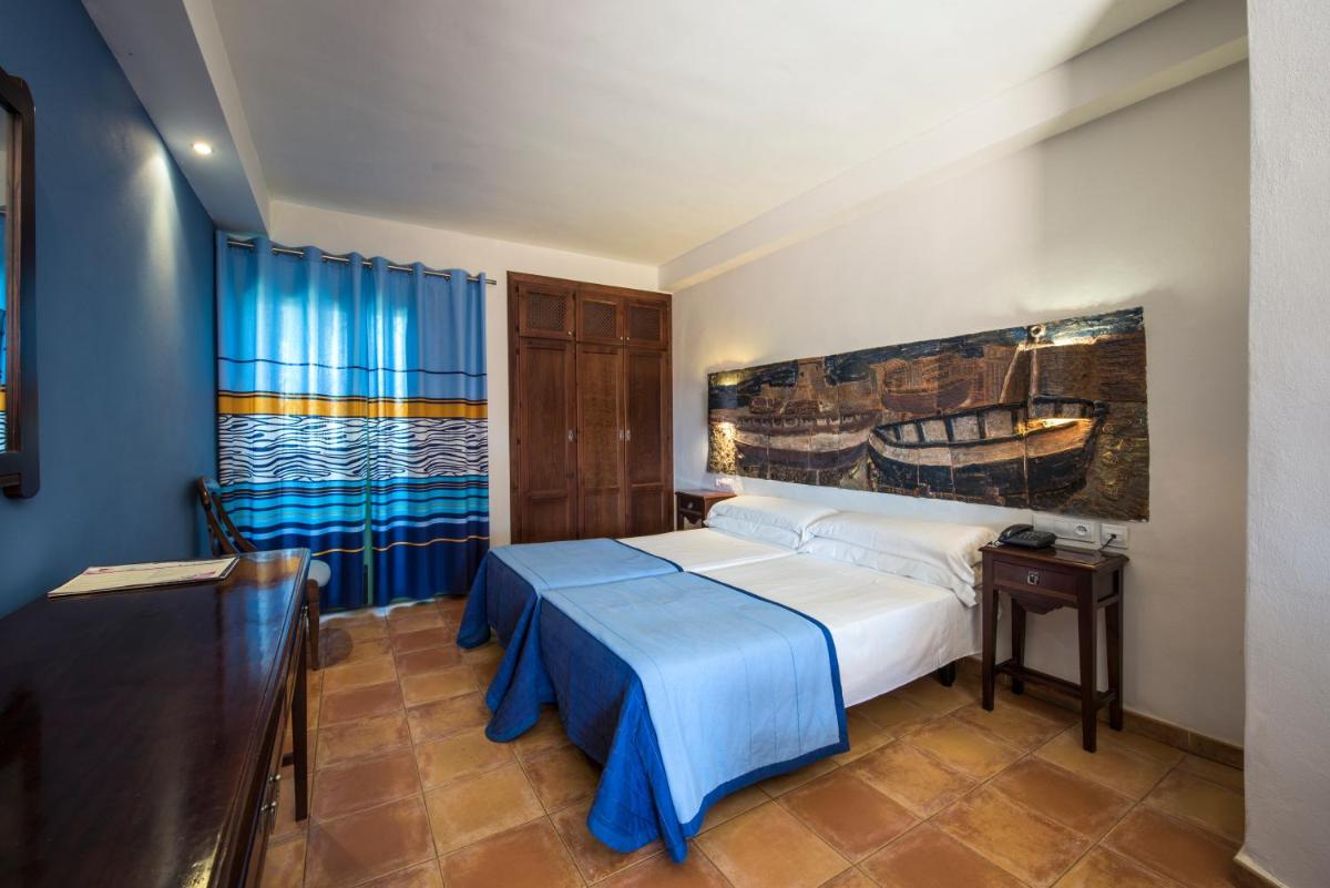 Cama o camas de una habitación en Hotel de Naturaleza Rodalquilar & Spa Cabo de Gata