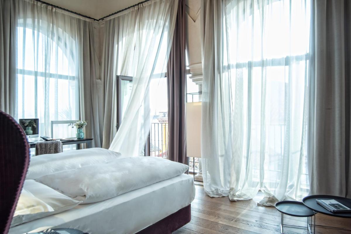 Cama o camas de una habitación en CoolRooms Palacio Villapanés 5 GL