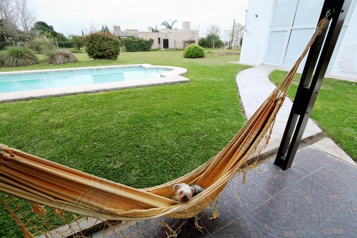 Hermosa Casa con Pileta Roldán Funes Rosario - Housity