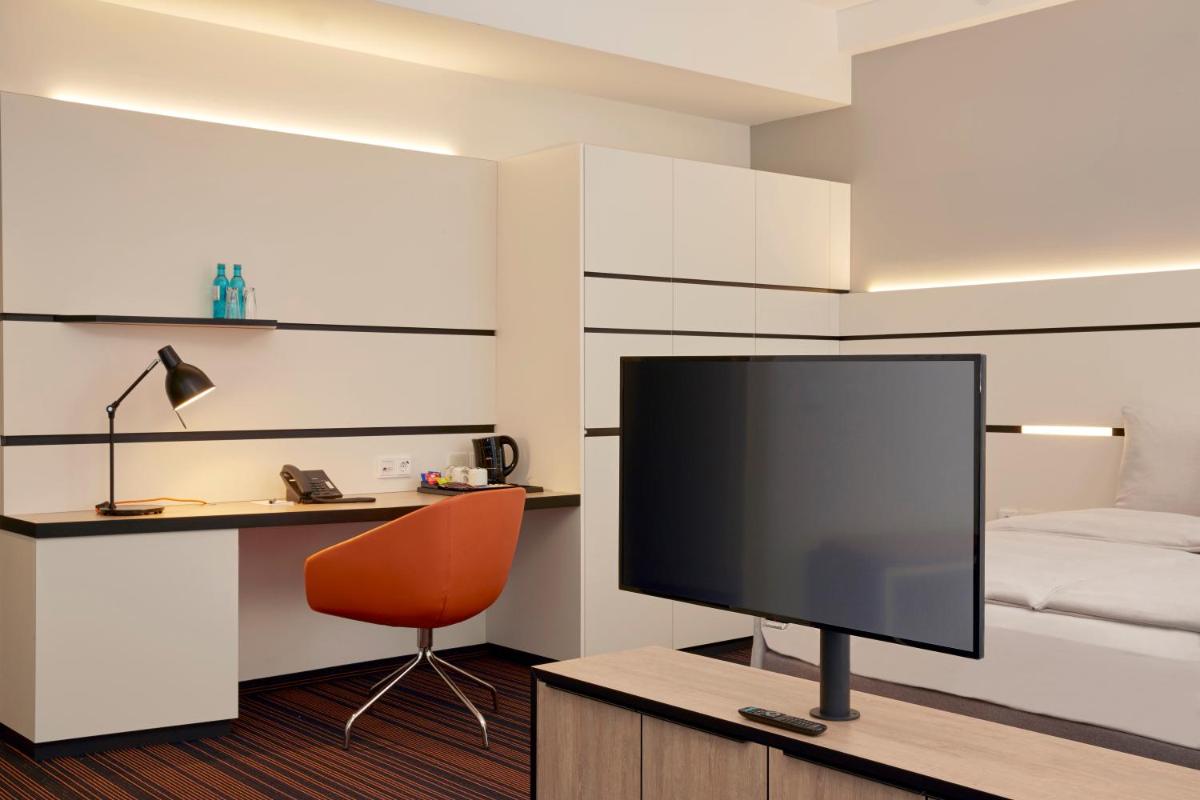 TV/Unterhaltungsangebot in der Unterkunft HYPERION Hotel Hamburg TV/Unterhaltungsangebot in der Unterkunft HYPERION Hotel Hamburg