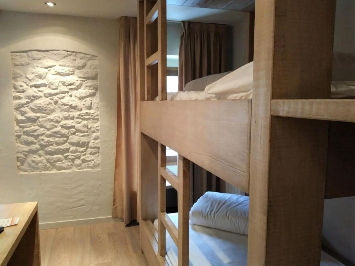 Cama o camas de una habitación en Hotel Santa Cristina Petit Spa