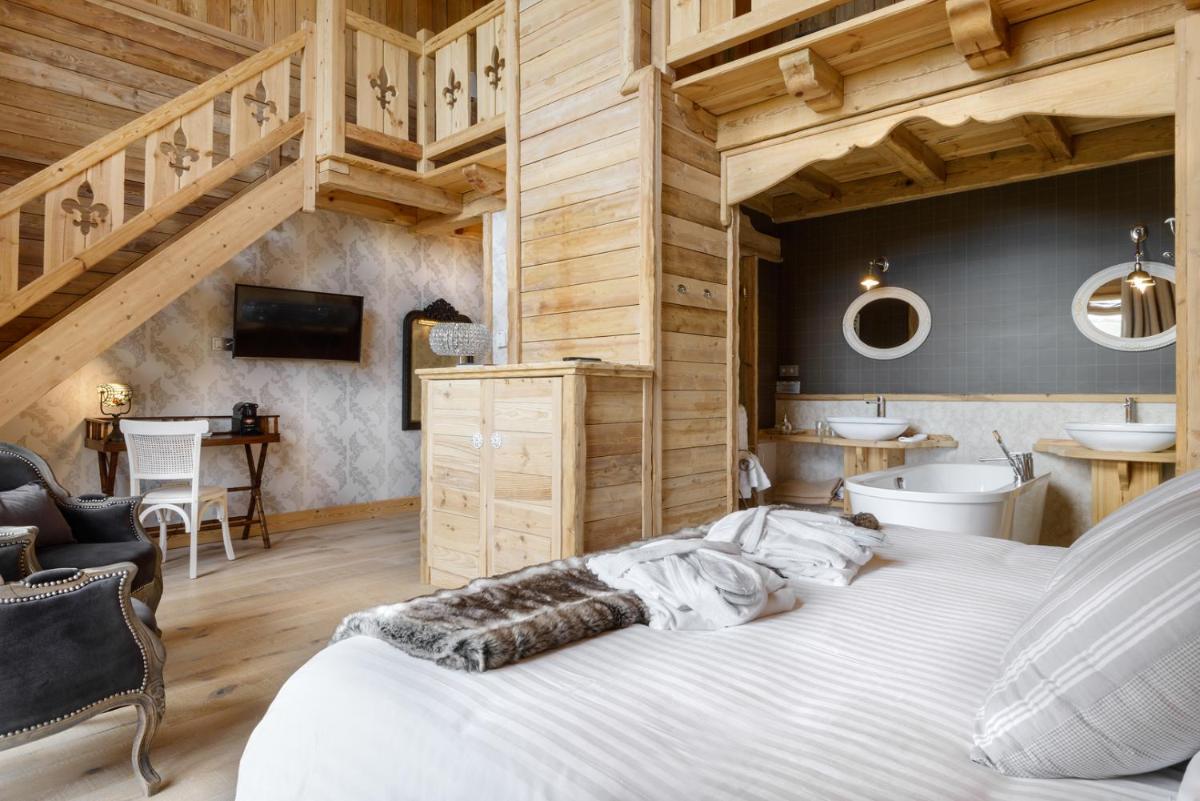 Cama o camas de una habitación en Hotel Viñas de Lárrede