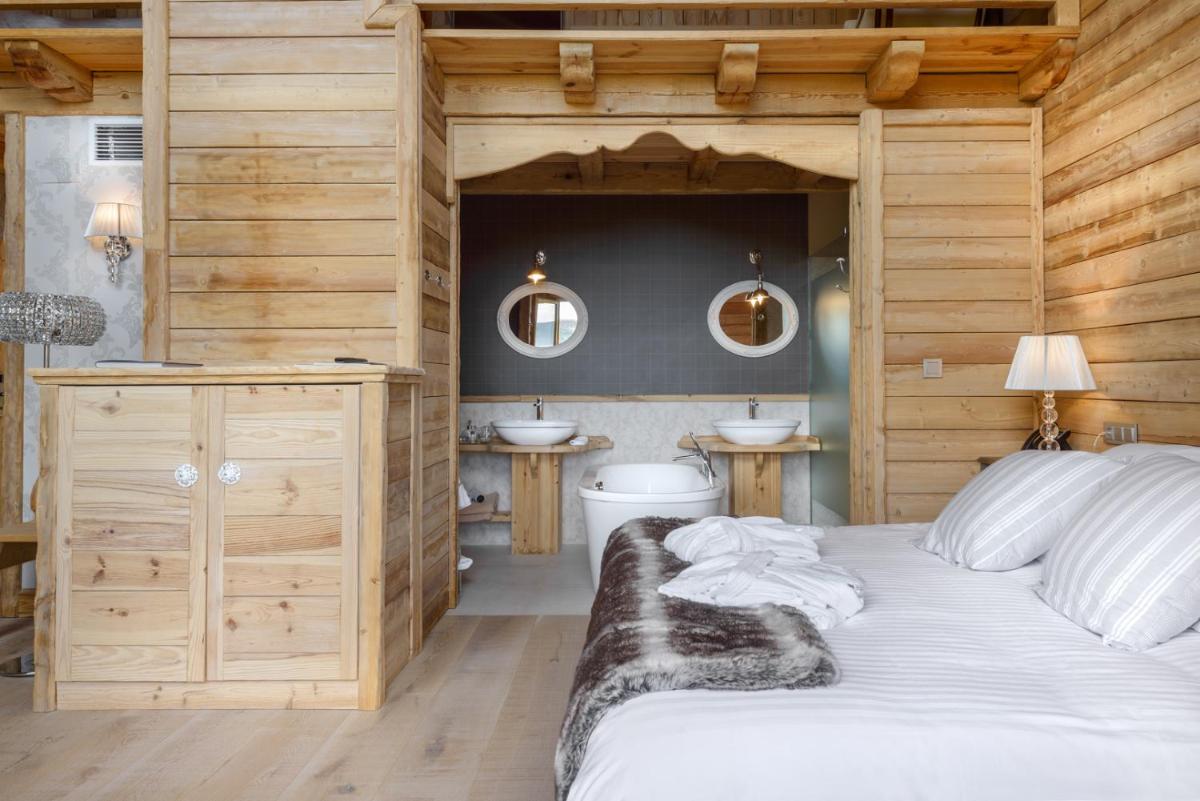 Cama o camas de una habitación en Hotel Viñas de Lárrede