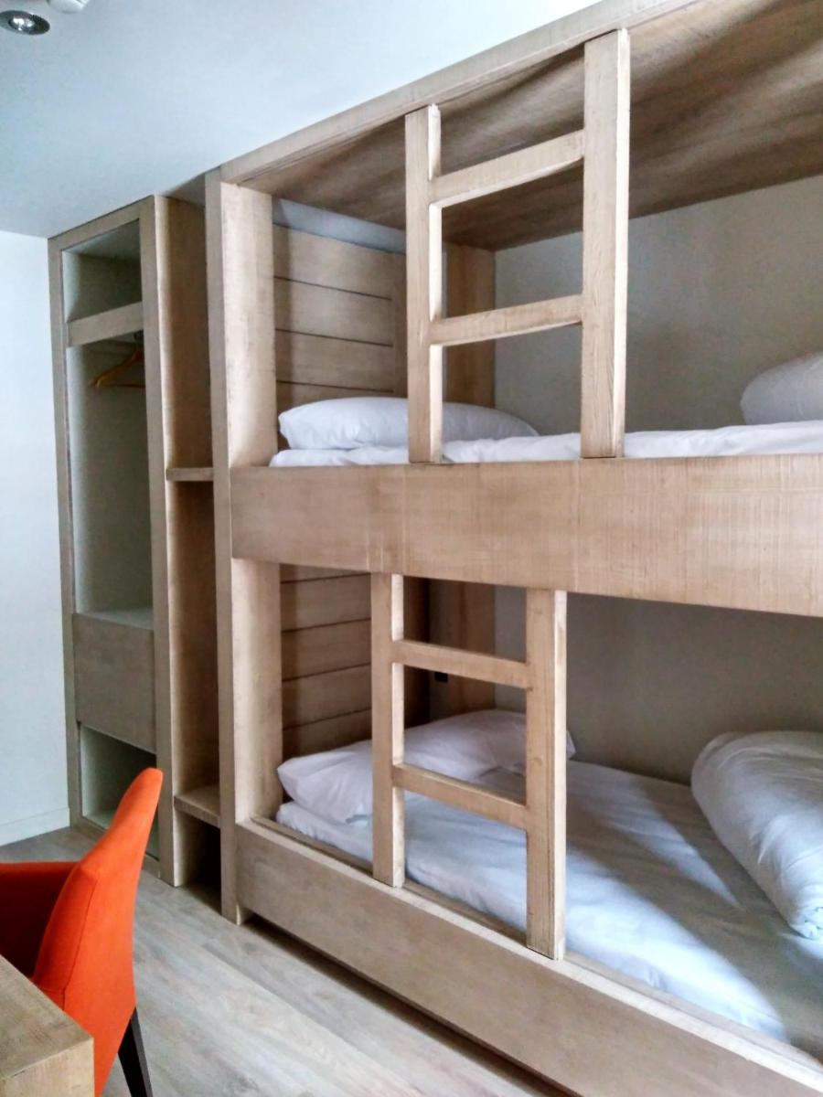 Cama o camas de una habitación en Hotel Santa Cristina Petit Spa