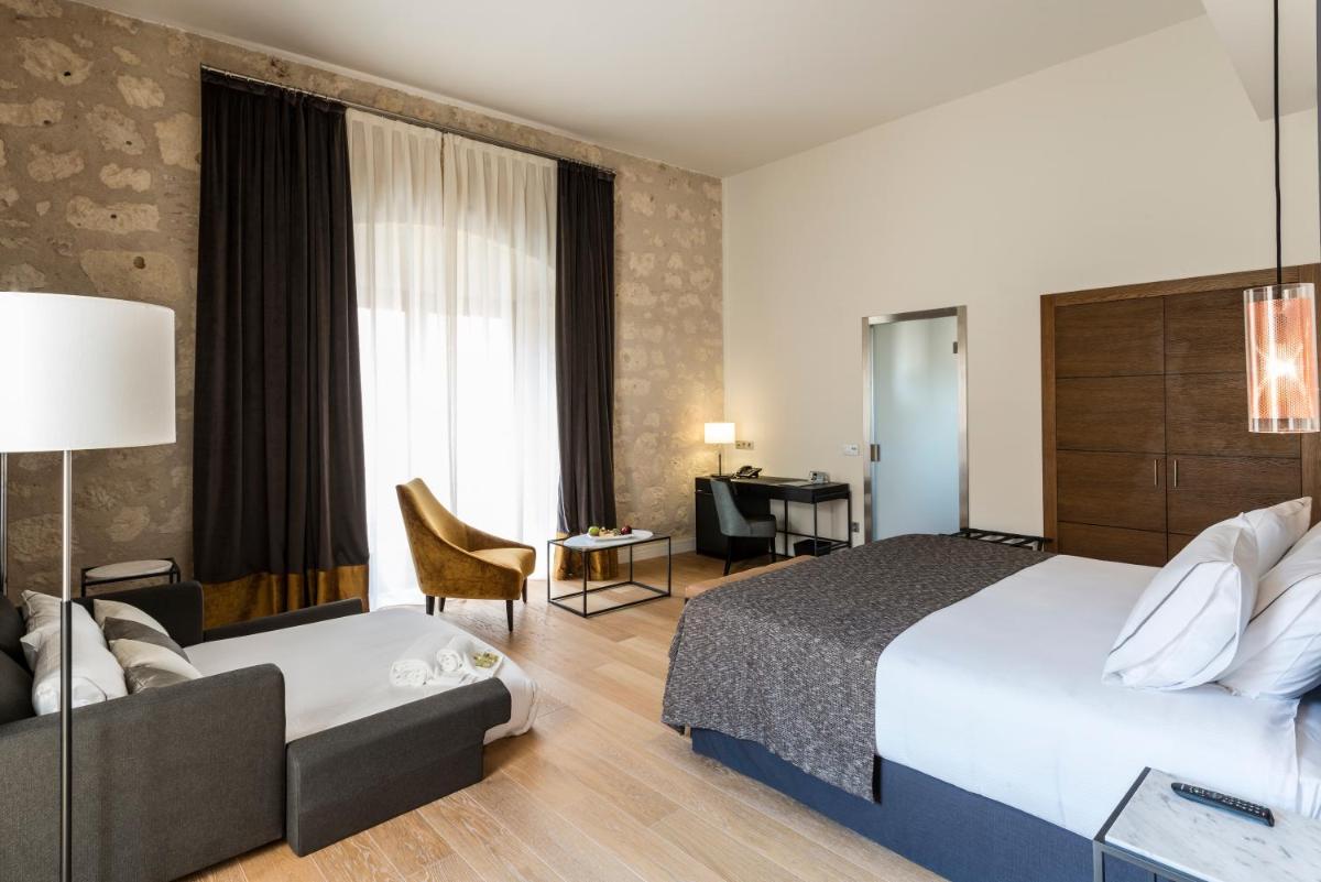 Cama o camas de una habitación en Áurea Convento Capuchinos by Eurostars Hotel Company
