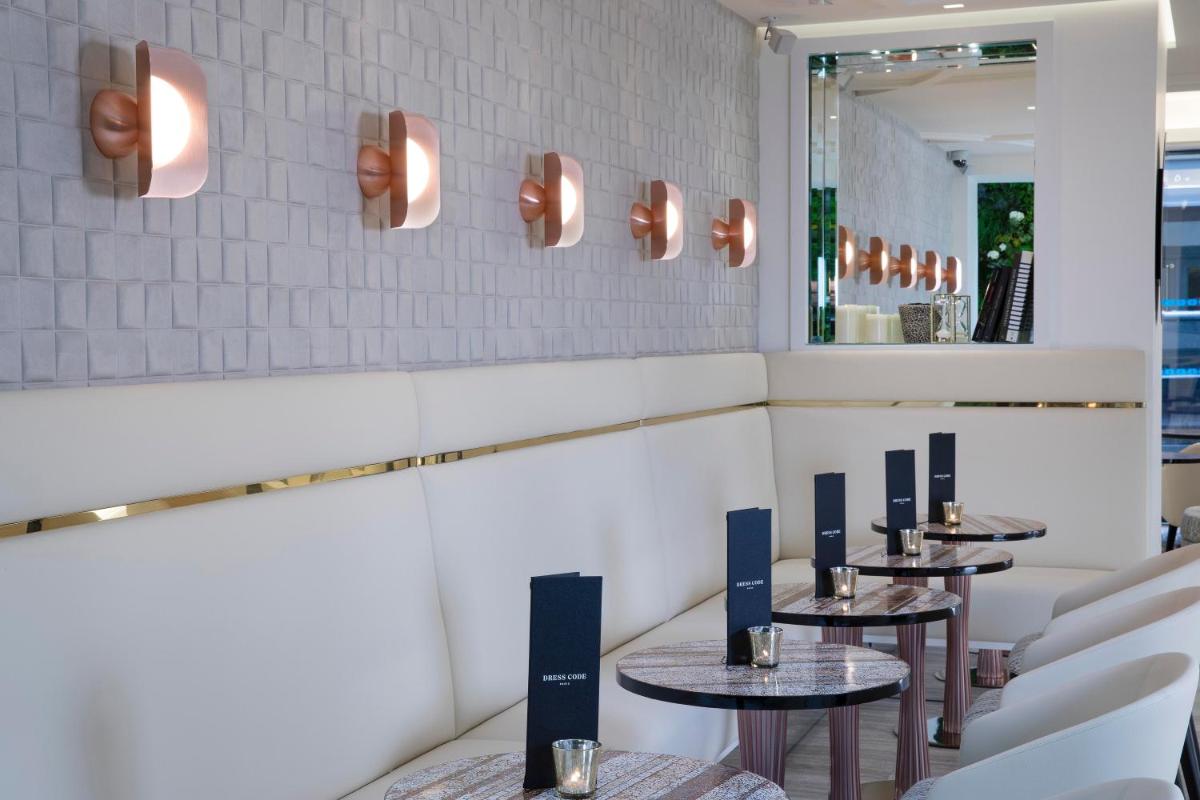 Restaurant ou autre lieu de restauration dans l'établissement Hôtel Dress Code