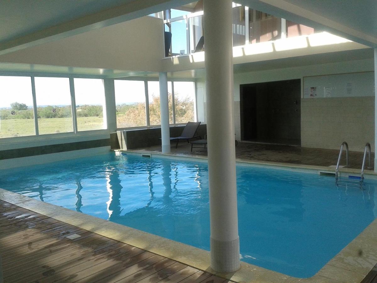 Piscine de l'établissement Résidence Hôtelière Natureva & Spa ou située à proximité