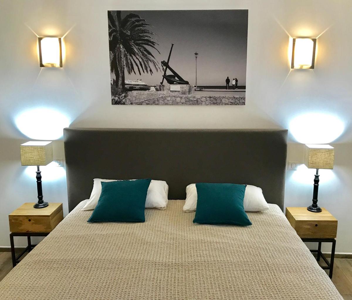 Un ou plusieurs lits dans un hébergement de l'établissement Hôtel Casa Rossa & Spa