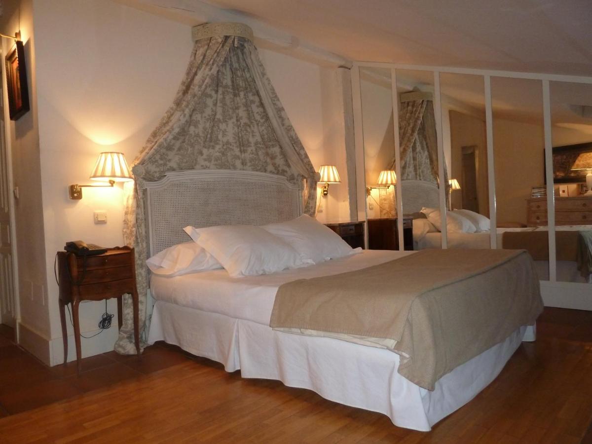 Cama o camas de una habitación en Hotel Spa Salinas de Imón
