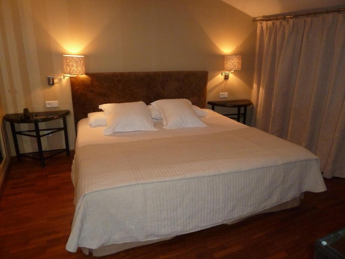 Cama o camas de una habitación en Hotel Spa Salinas de Imón