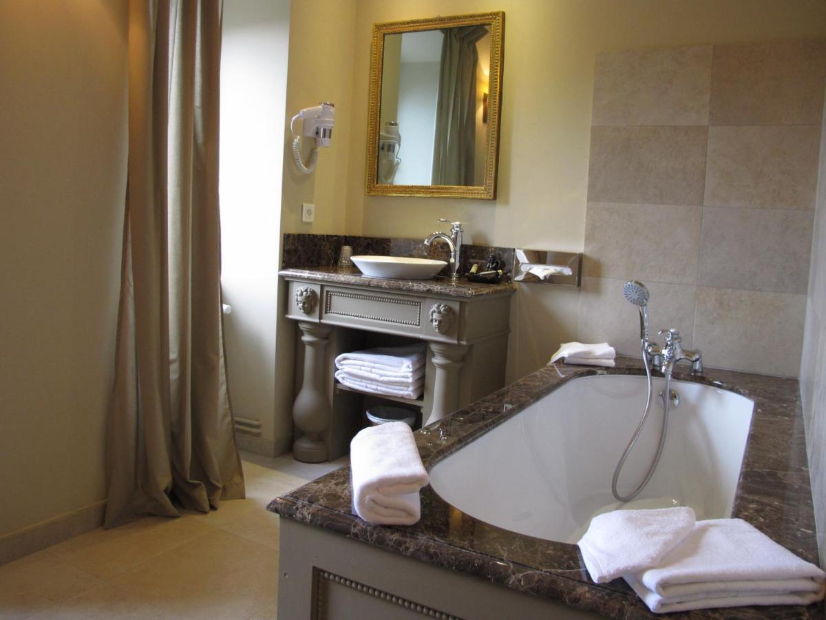 Salle de bains dans l'établissement Hôtel Restaurant Spa Le Sauvage